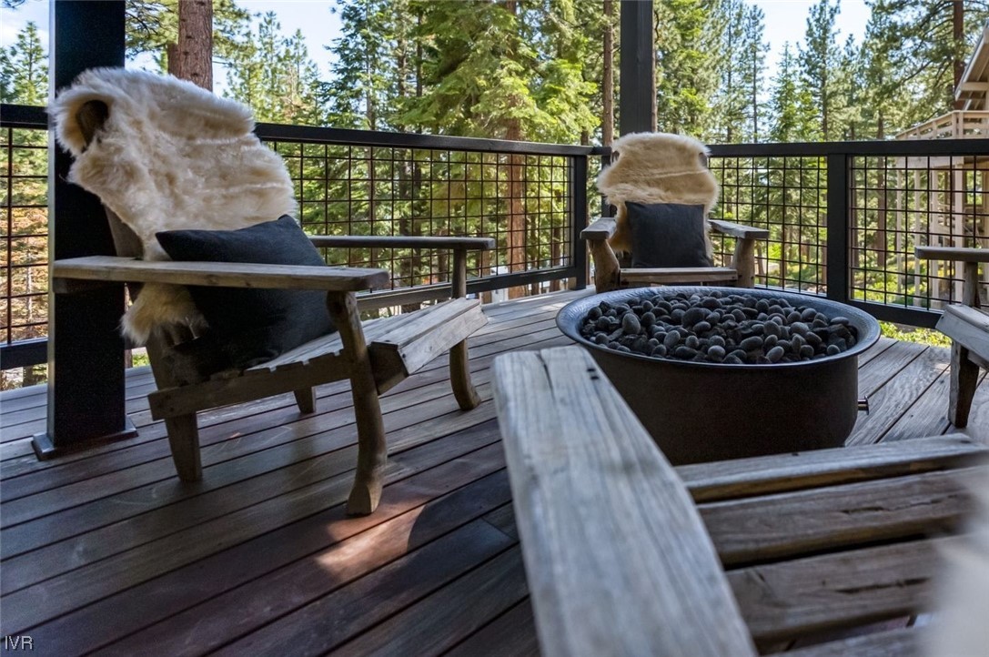 859 Tyner Way Incline Village, NV 89451 - Photo 32 of 33 a view of a balcony with wooden floor and outdoor seating