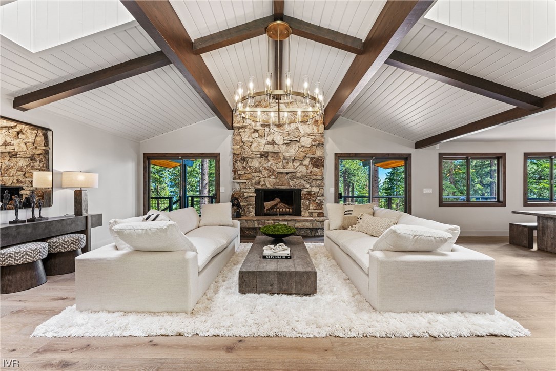 859 Tyner Way Incline Village, NV 89451 - Photo 5 of 33 a living room with furniture a chandelier and a chandelier
