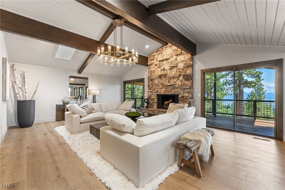 859 Tyner Way Incline Village, NV 89451 - Photo 7 of 33 a living room with furniture large windows and wooden floor