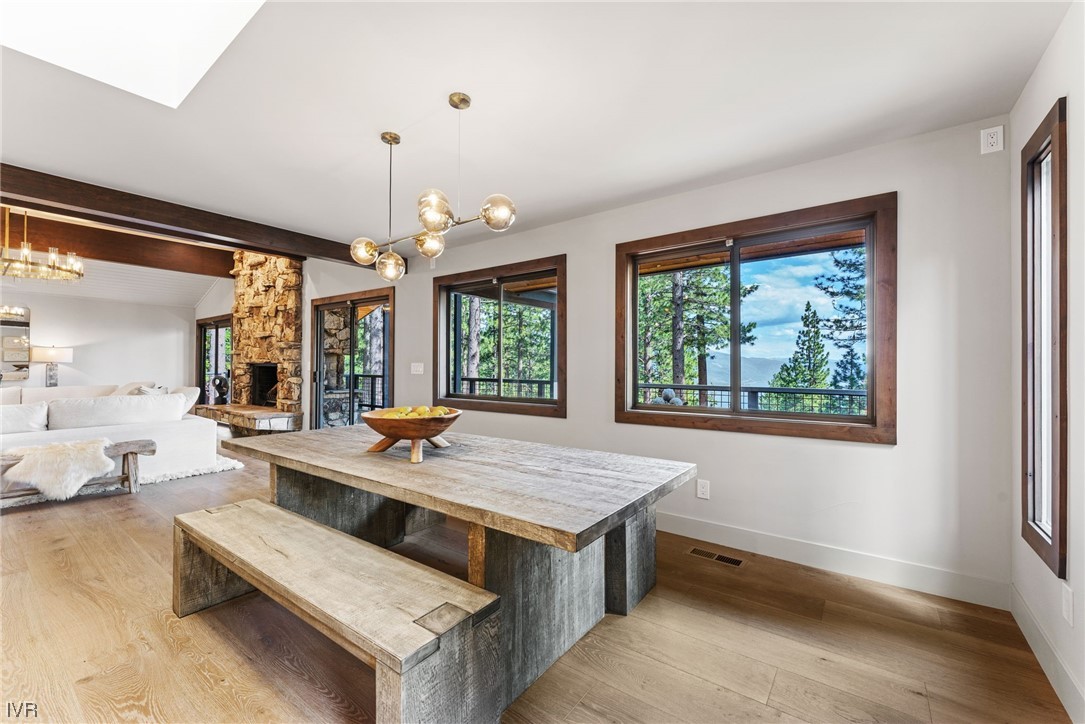 859 Tyner Way Incline Village, NV 89451 - Photo 9 of 33 a living room with stainless steel appliances granite countertop furniture and a chandelier