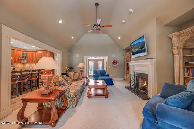 a kitchen with stainless steel appliances granite countertop a refrigerator a sink and dishwasher