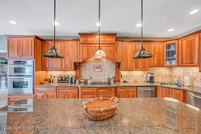 a bath tub sitting in a bathroom next to a window