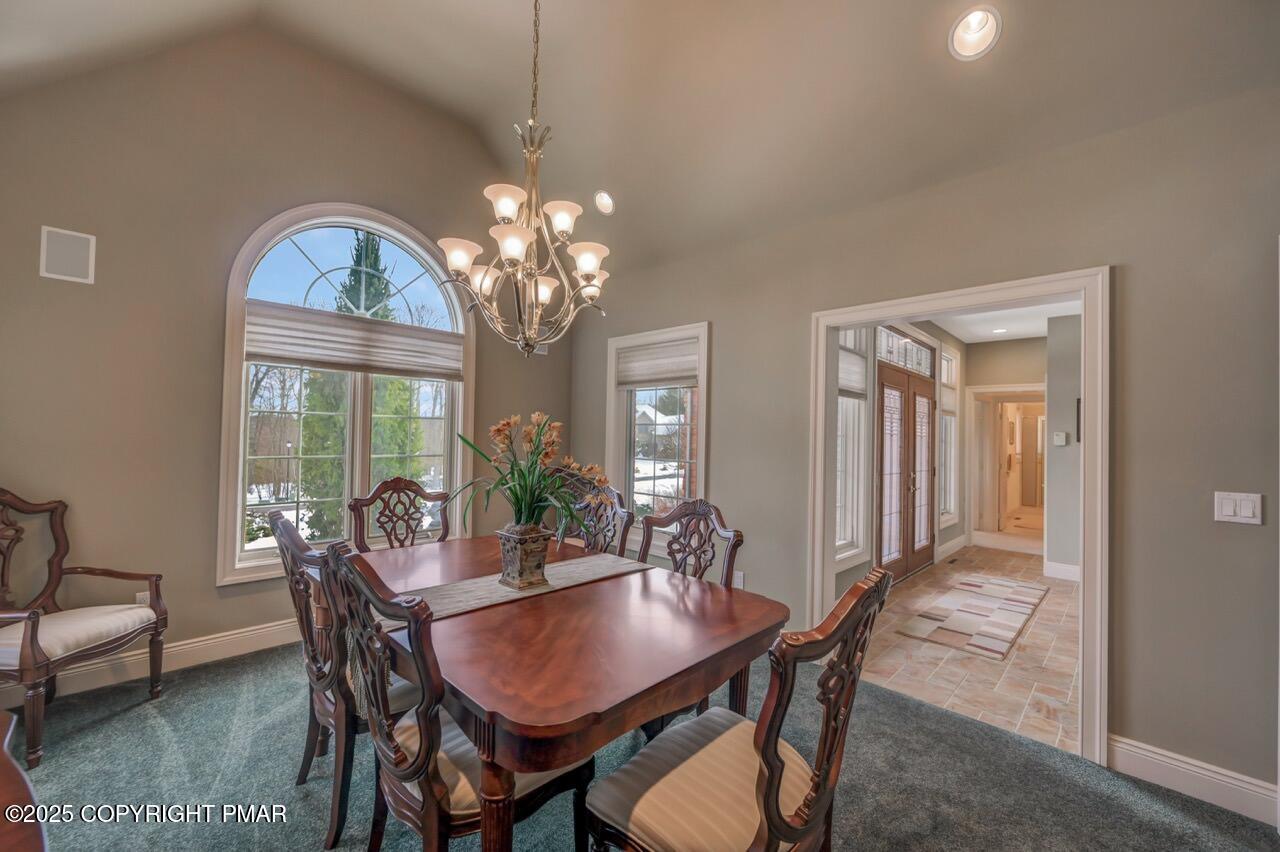 235 Wolf Hollow Road Lake Harmony, PA 18624 - Photo 38 of 96 a view of a dining room with furniture window and wooden floor