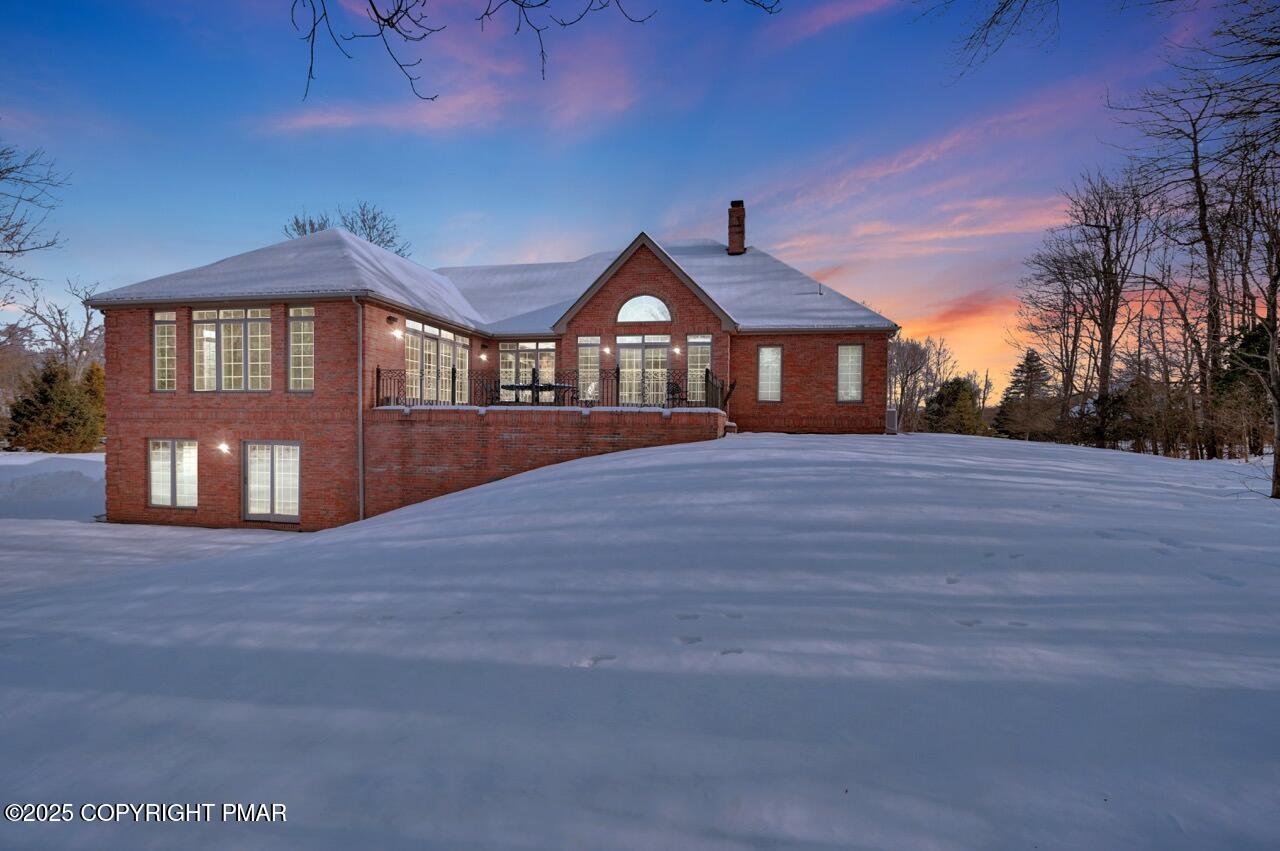 235 Wolf Hollow Road Lake Harmony, PA 18624 - Photo 5 of 96 a front view of a house with a yard