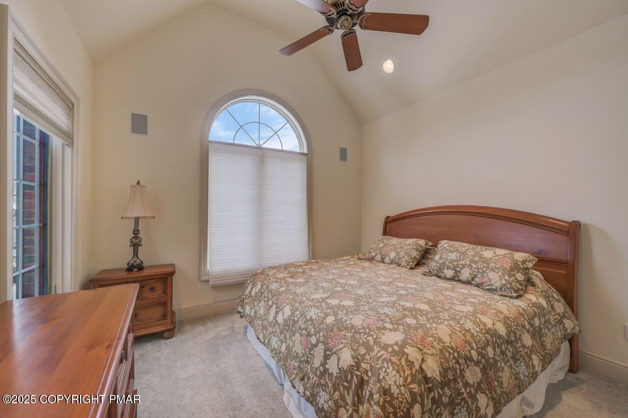 235 Wolf Hollow Road Lake Harmony, PA 18624 - Photo 58 of 96 a bedroom with a bed and window