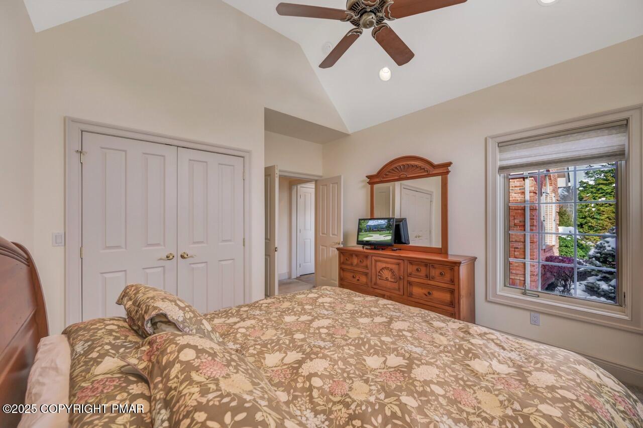235 Wolf Hollow Road Lake Harmony, PA 18624 - Photo 61 of 98 a bed room with a bed and a dresser