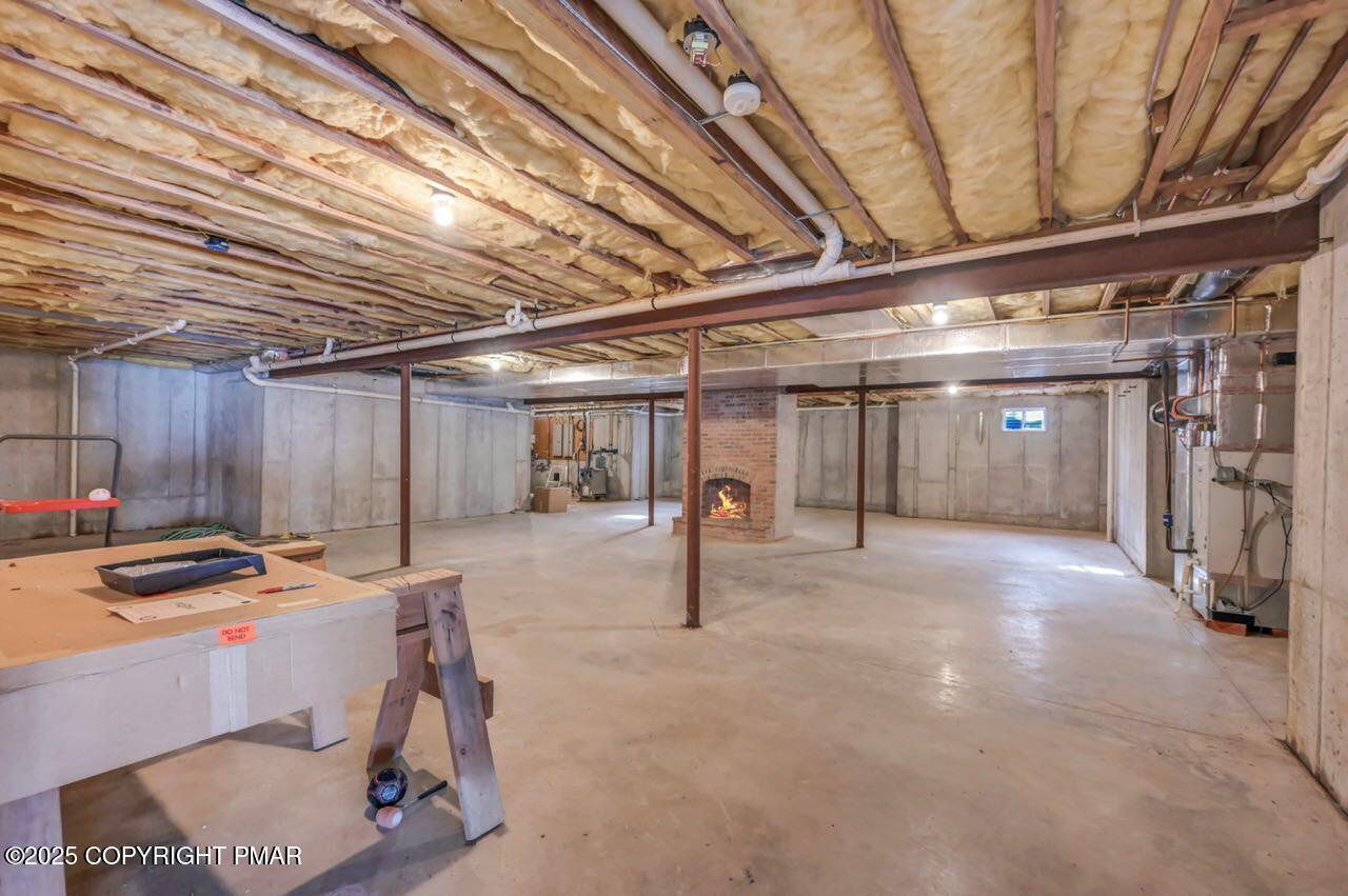 235 Wolf Hollow Road Lake Harmony, PA 18624 - Photo 78 of 96 a view of a room with gym equipment