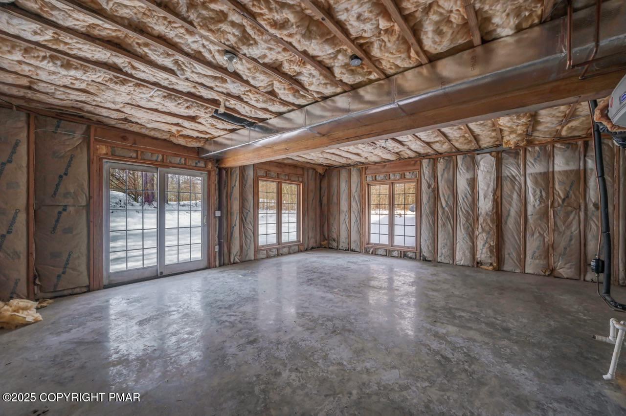 235 Wolf Hollow Road Lake Harmony, PA 18624 - Photo 82 of 98 a view of an empty room with a window
