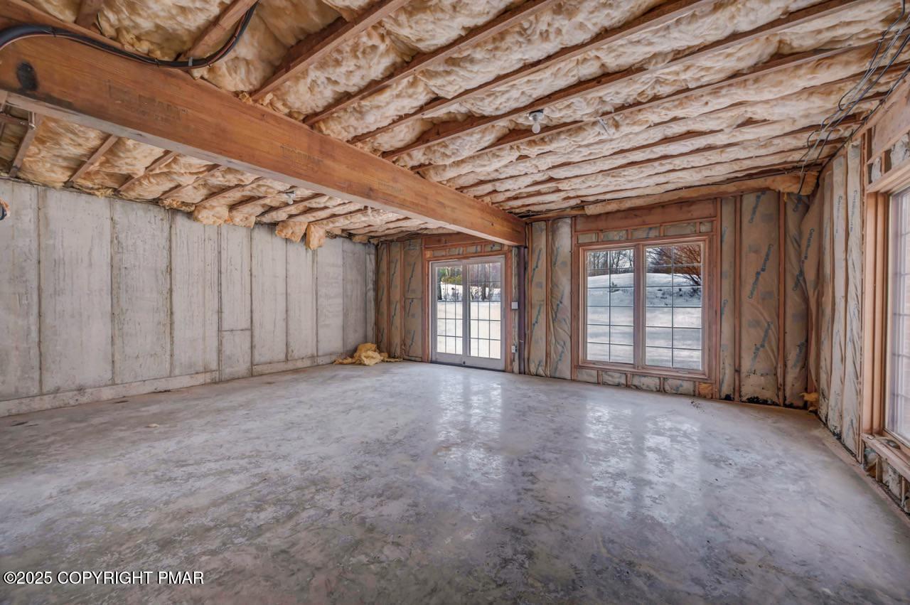 235 Wolf Hollow Road Lake Harmony, PA 18624 - Photo 84 of 98 a view of an empty room with windows