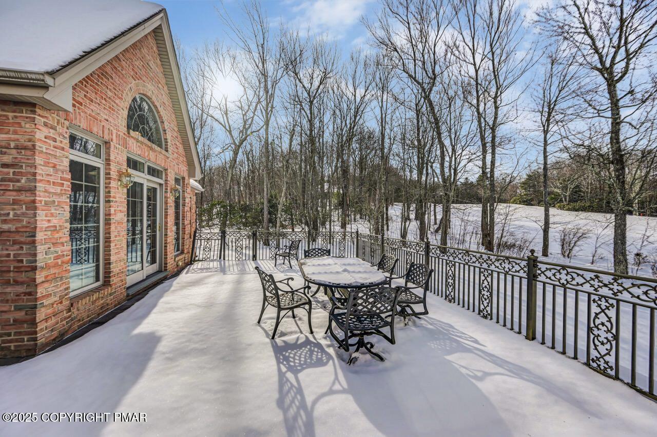 235 Wolf Hollow Road Lake Harmony, PA 18624 - Photo 85 of 98 a view of a patio with iron fence