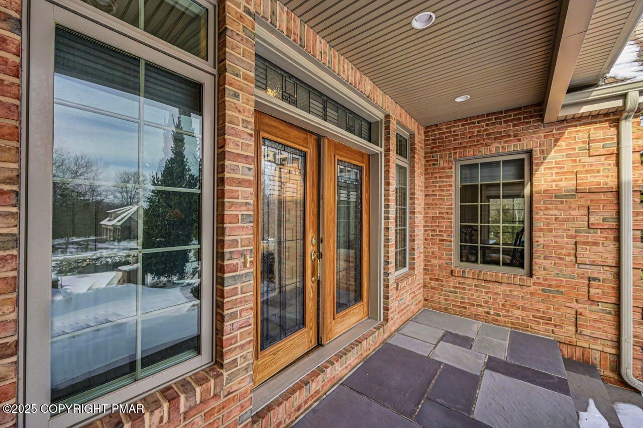 235 Wolf Hollow Road Lake Harmony, PA 18624 - Photo 9 of 96 a view of a entryway door front of house