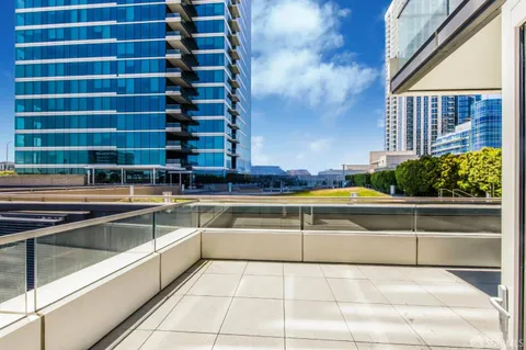 a view of a kitchen with a tub and more windows