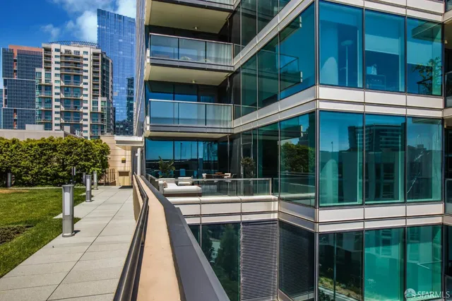 a view of a house with a yard balcony