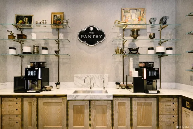 a kitchen with a sink and cabinets