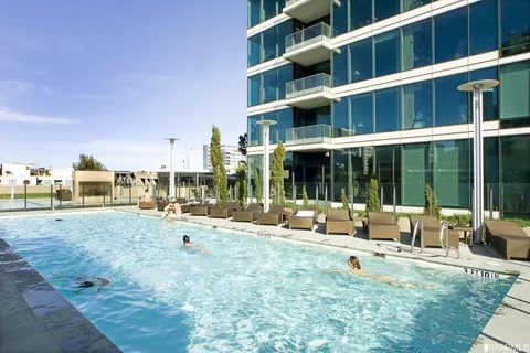 a view of pool with outdoor seating
