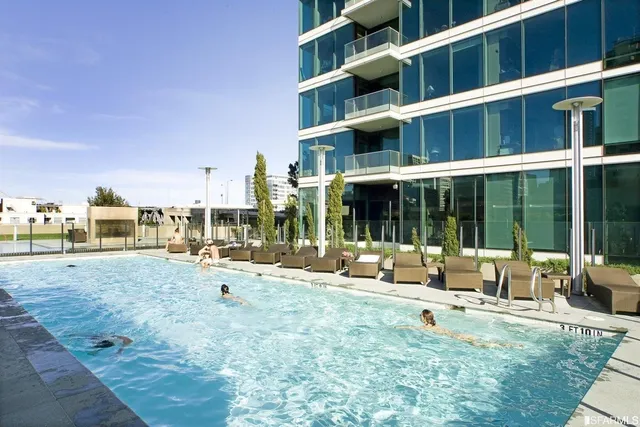 a view of pool with outdoor seating