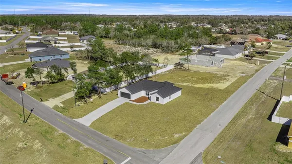 a view of a swimming pool with a lake view