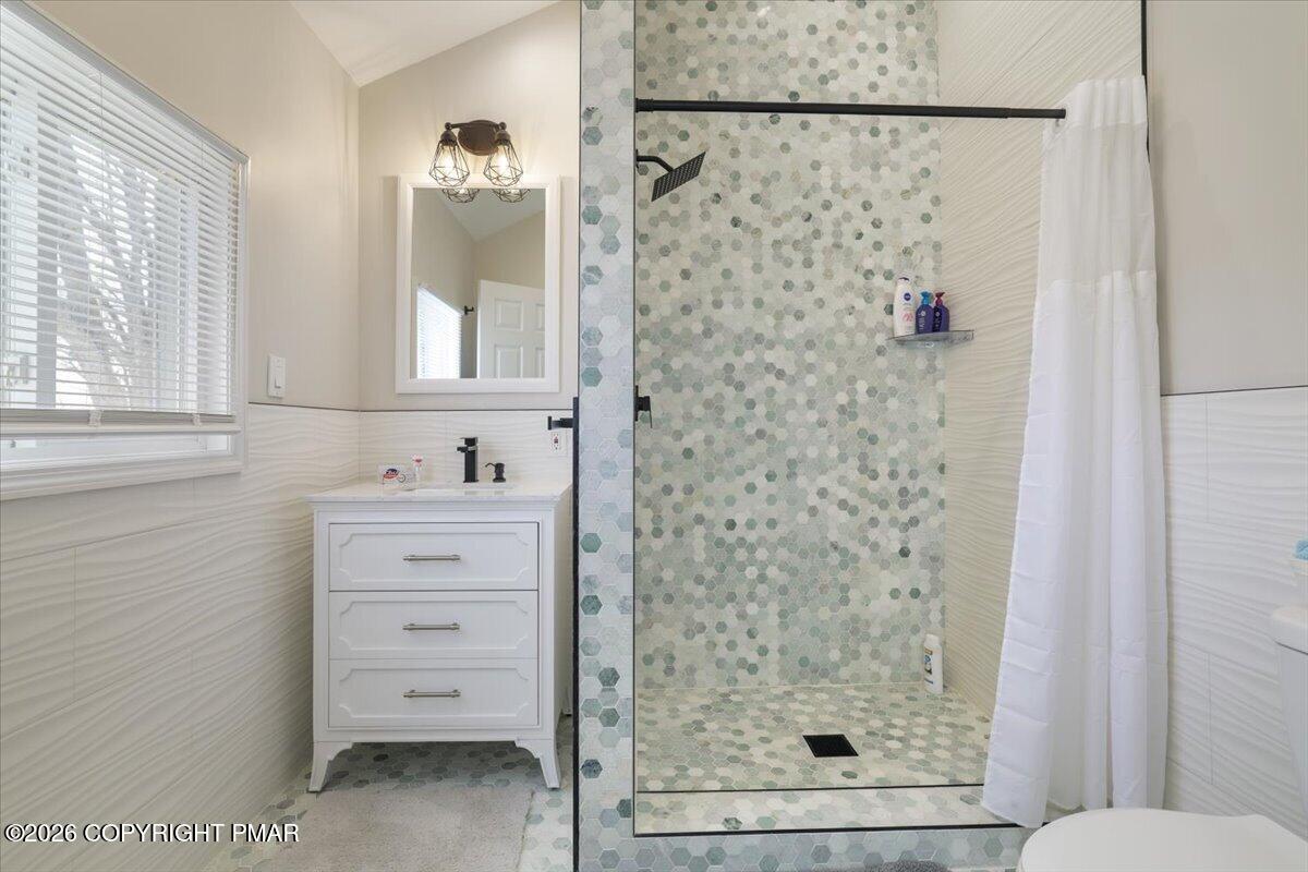 5873 Decker Road Bushkill, PA 18324 - Photo 12 of 57 a bathroom with a shower