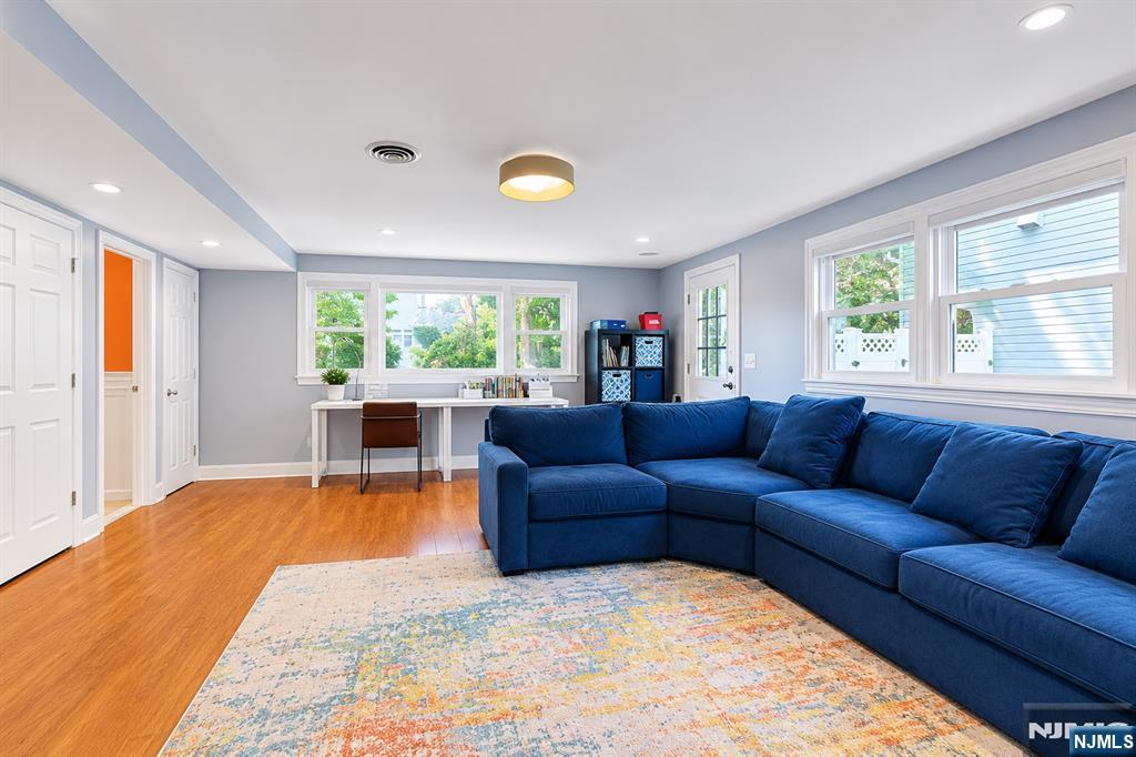 514 Rutland Avenue Teaneck, NJ 07666 - Photo 25 of 40 a living room with furniture and a large window