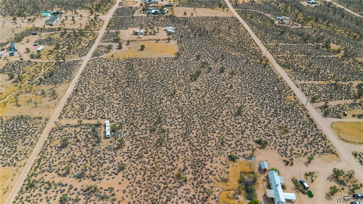 26885 Verde Meadview, AZ 86444 - Photo 3 of 31 view of a dry yard with wooden floor