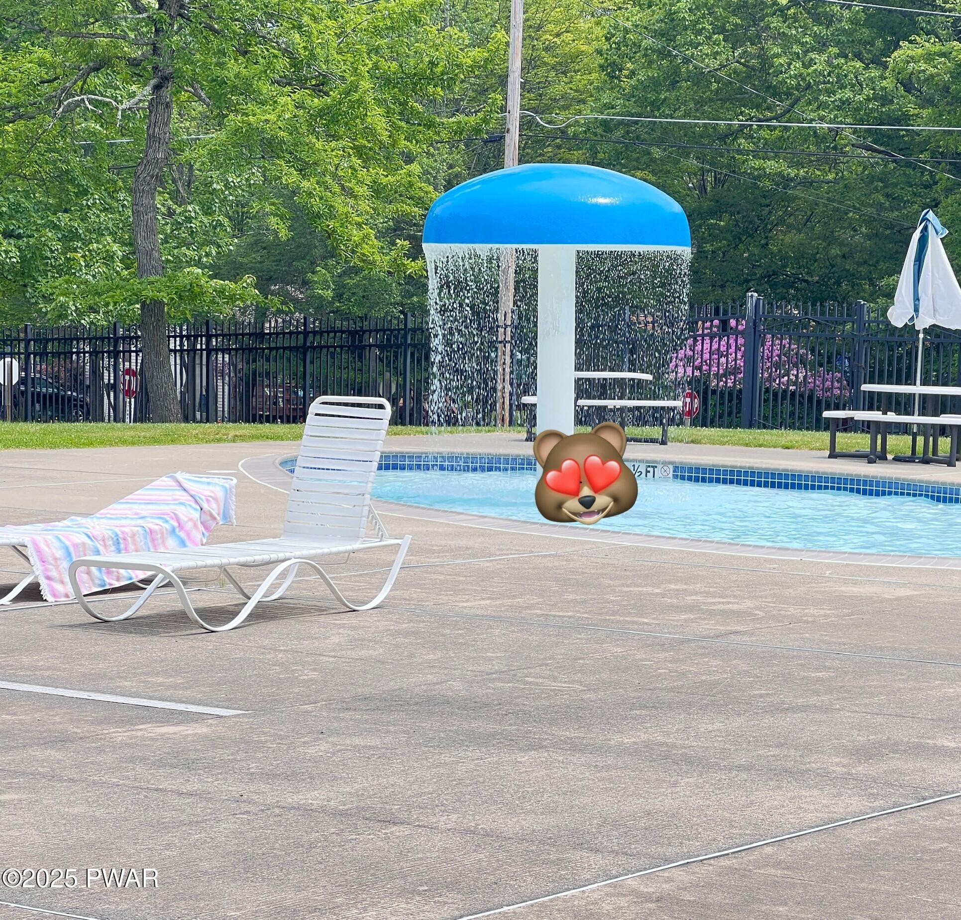 124 Roundhill Road Dingmans Ferry, PA 18328 - Photo 30 of 47 a view of outdoor space with swimming pool and seating
