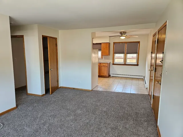 a view of an empty room and window