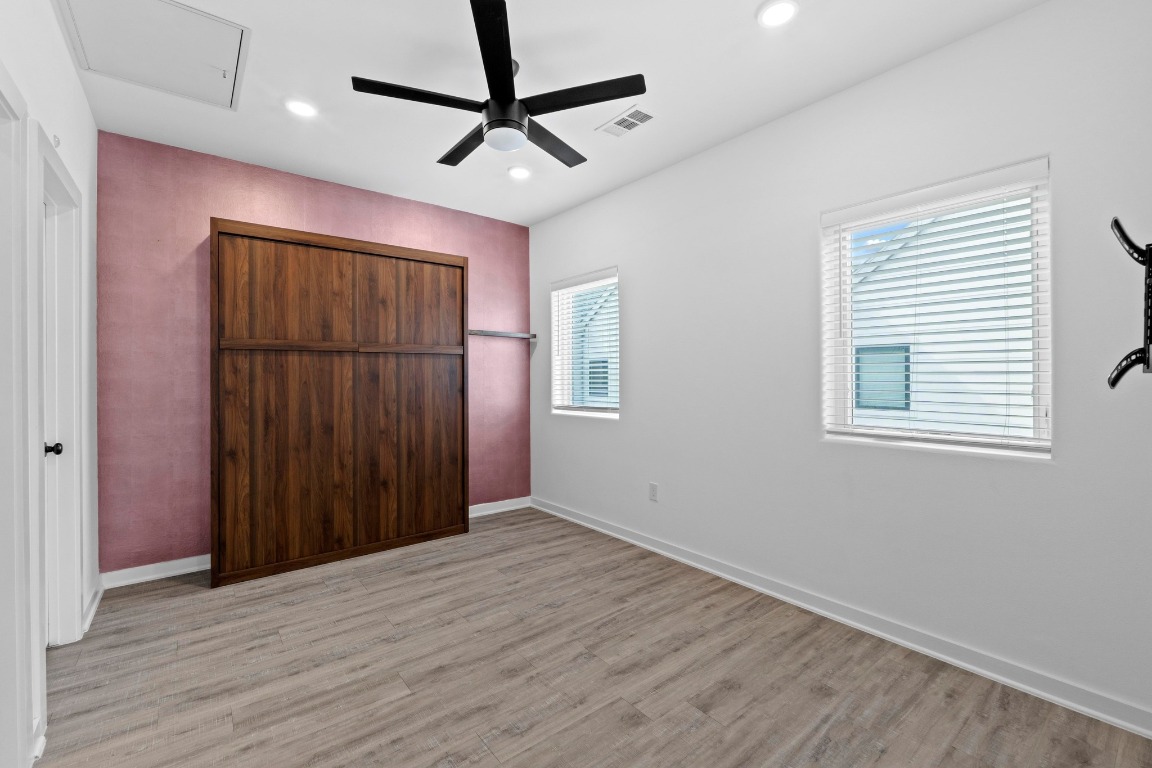 5924 South Congress Avenue, Unit 114S Austin, TX 78745 - Photo 12 of 24 a view of an empty room with a window