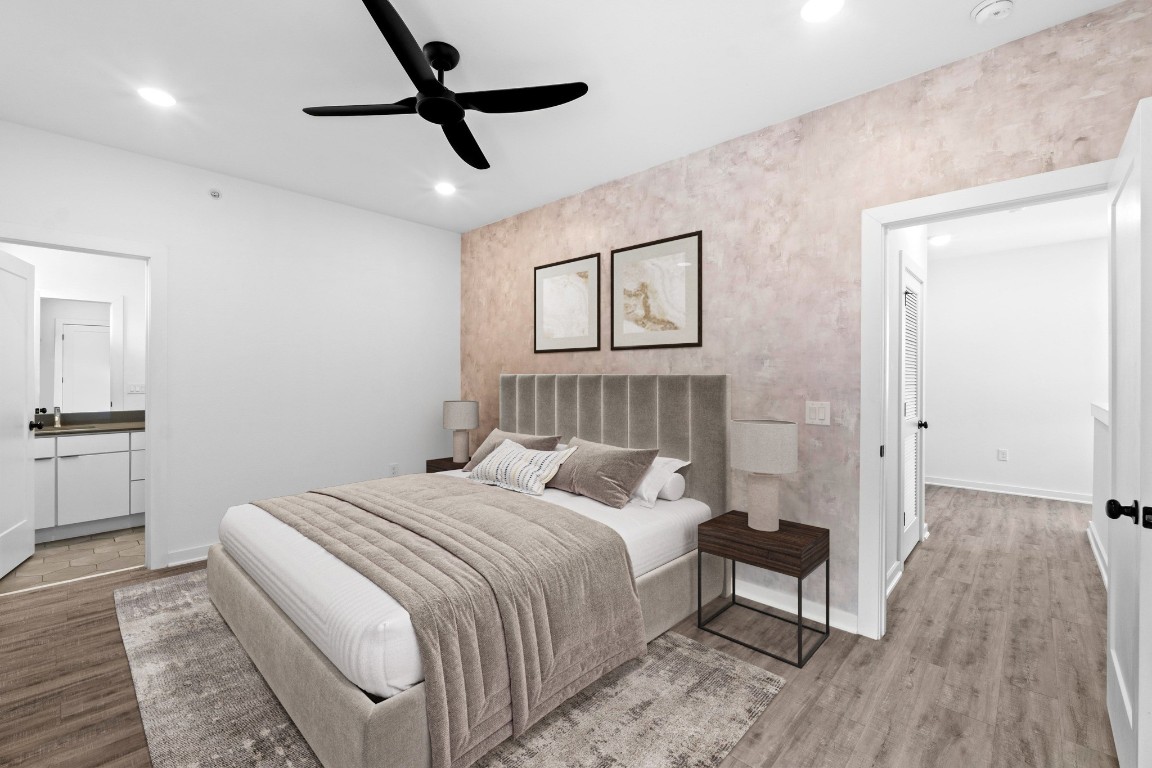 5924 South Congress Avenue, Unit 114S Austin, TX 78745 - Photo 5 of 24 a bedroom with a bed and a chandelier