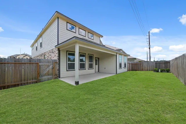 a street sign that is sitting in front of a building