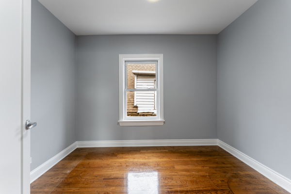 1215 North Harding Avenue, Unit 2 Chicago, IL 60651 - Photo 5 of 10 a view of a room with window