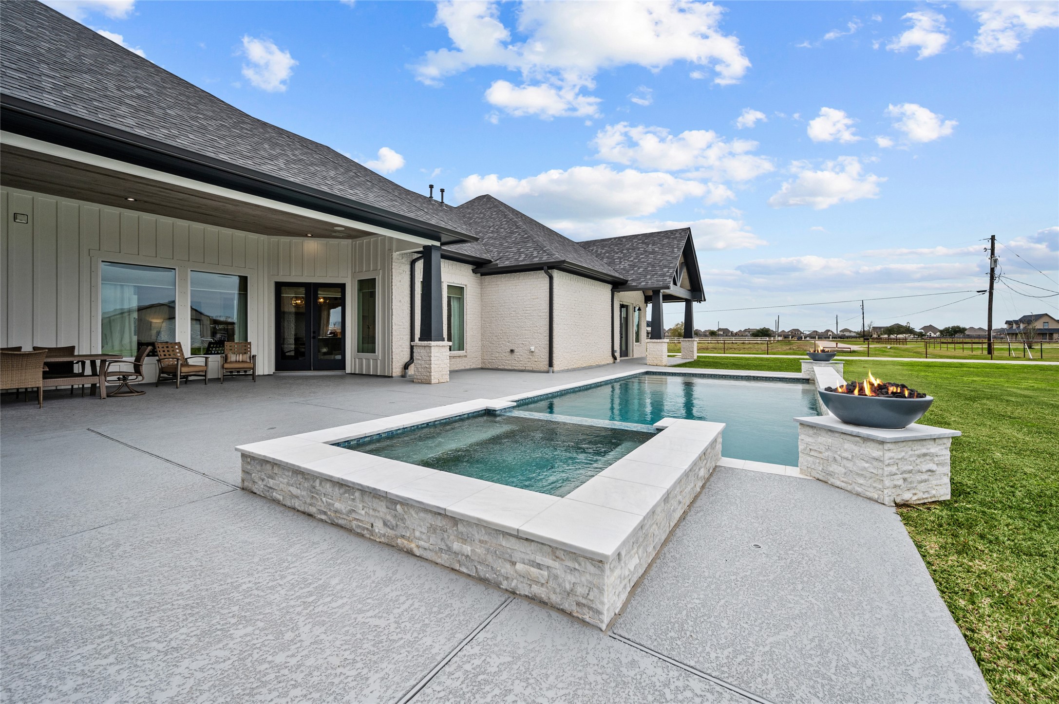 14923 Old Irish Farm Road Baytown, TX 77523 - Photo 37 of 50 Avree Custom Pool and spa include a waterfall, 2 fire features and a large tanning ledge