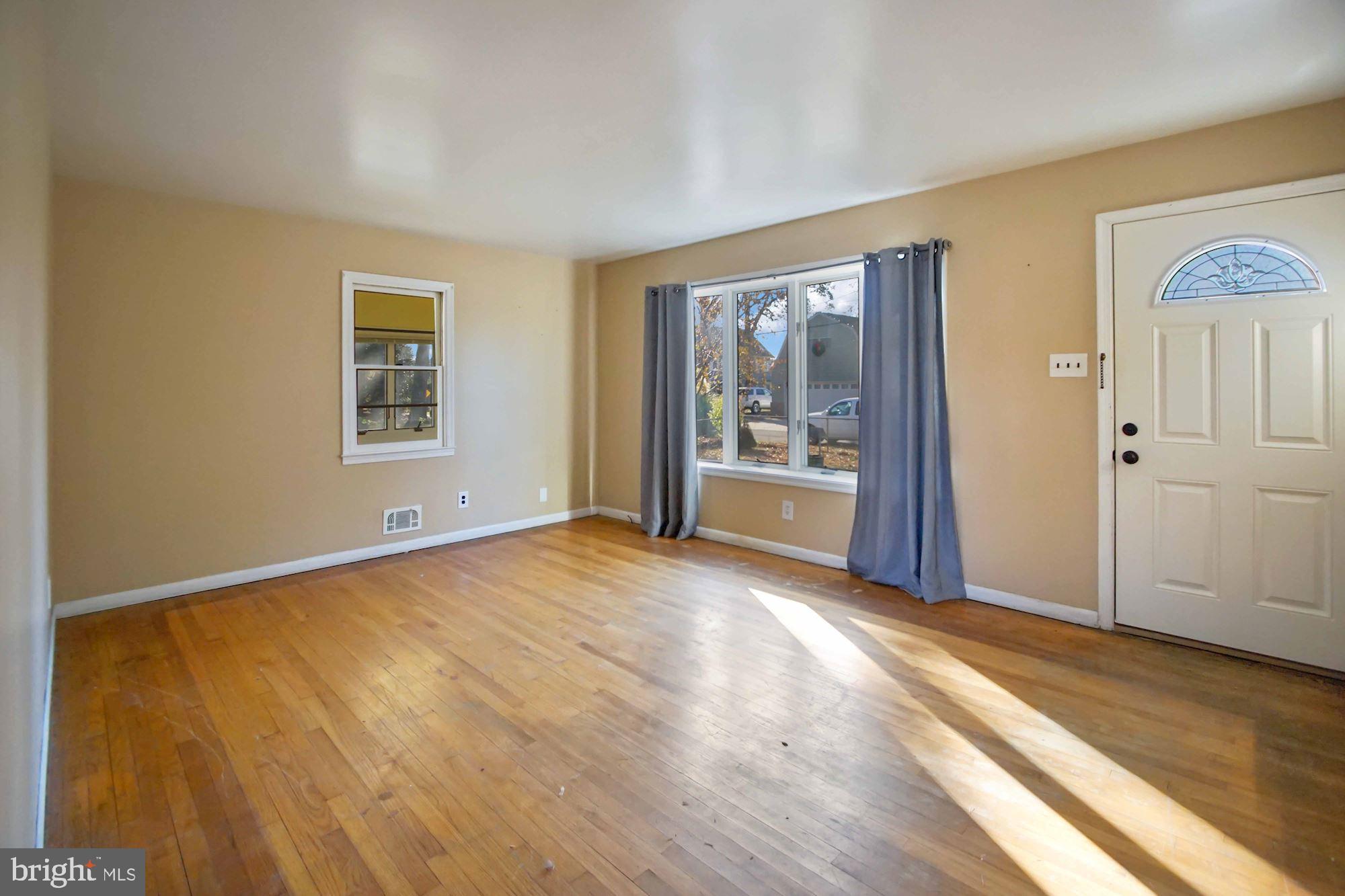 1724 Grandview Road Pasadena, MD 21122 - Photo 9 of 56 Living Room with Large Bay Window