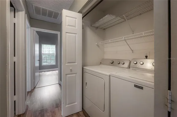 a utility room with dryer and washer