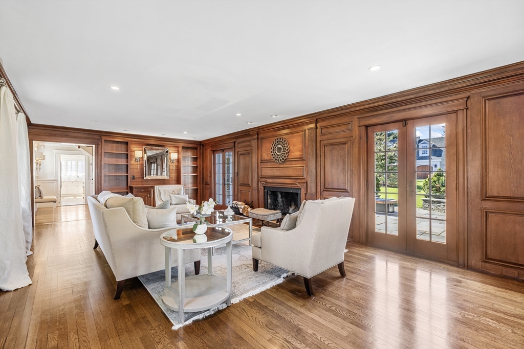 3 Goldthwait Road Marblehead, MA 01945 - Photo 17 of 30 a living room with fireplace furniture and a wooden floor