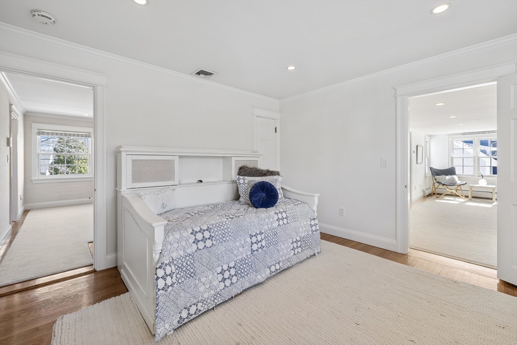 3 Goldthwait Road Marblehead, MA 01945 - Photo 23 of 30 a bedroom with a bed and a large mirror on the dresser