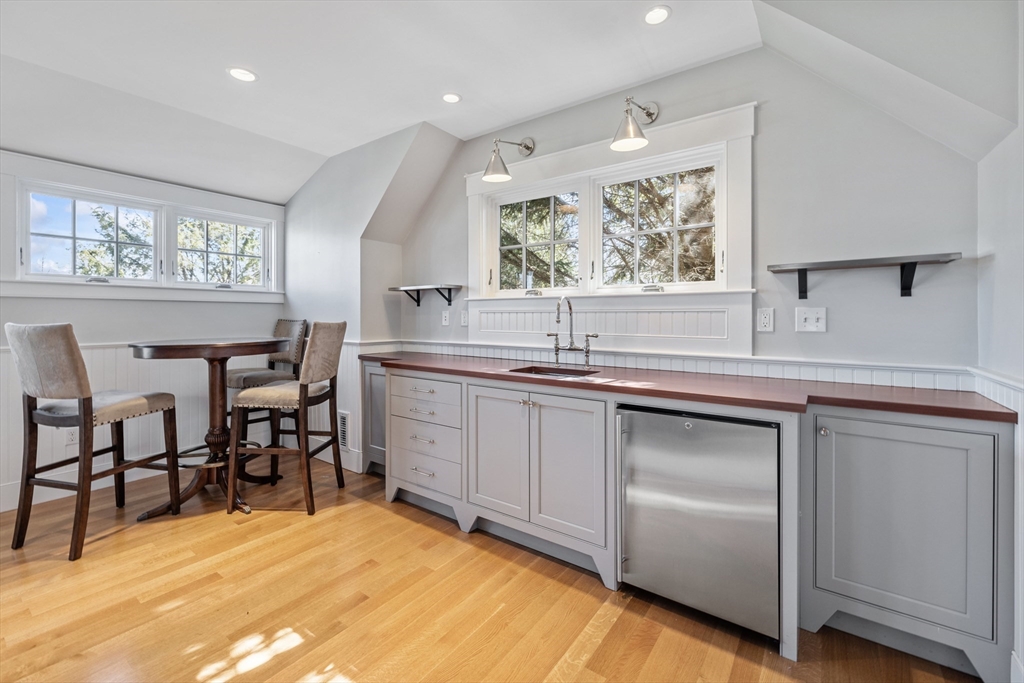 3 Goldthwait Road Marblehead, MA 01945 - Photo 27 of 30 a kitchen with stainless steel appliances granite countertop a sink and cabinets