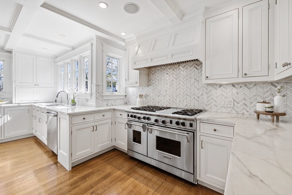 3 Goldthwait Road Marblehead, MA 01945 - Photo 7 of 30 a white kitchen with granite countertop stainless steel appliances