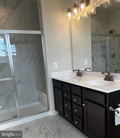 a bathroom with a toilet and a sink