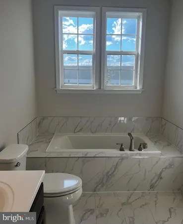 a bathroom with a bathtub