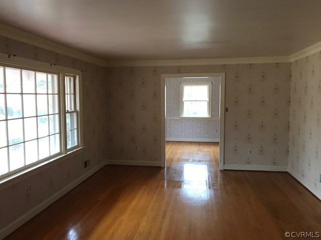 3629 Falstone Road North Chesterfield, VA 23234 - Photo 4 of 24 an empty room with wooden floor and windows