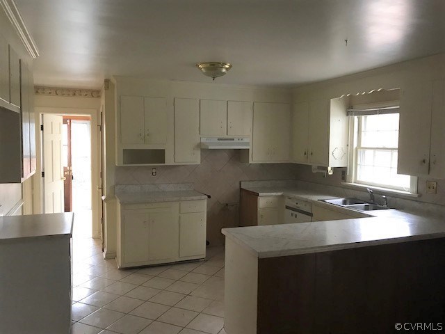 3629 Falstone Road North Chesterfield, VA 23234 - Photo 7 of 24 a kitchen that has a sink and a stove in it
