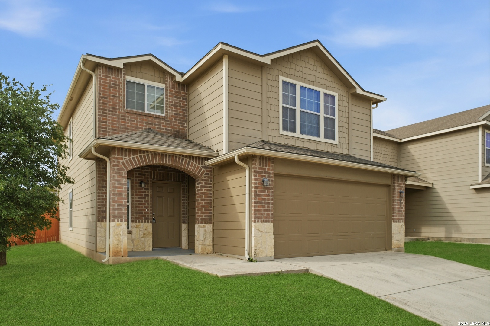 403 Walnut Crest Schertz, TX 78154 - Photo 3 of 30 a front view of a house with a yard and garage