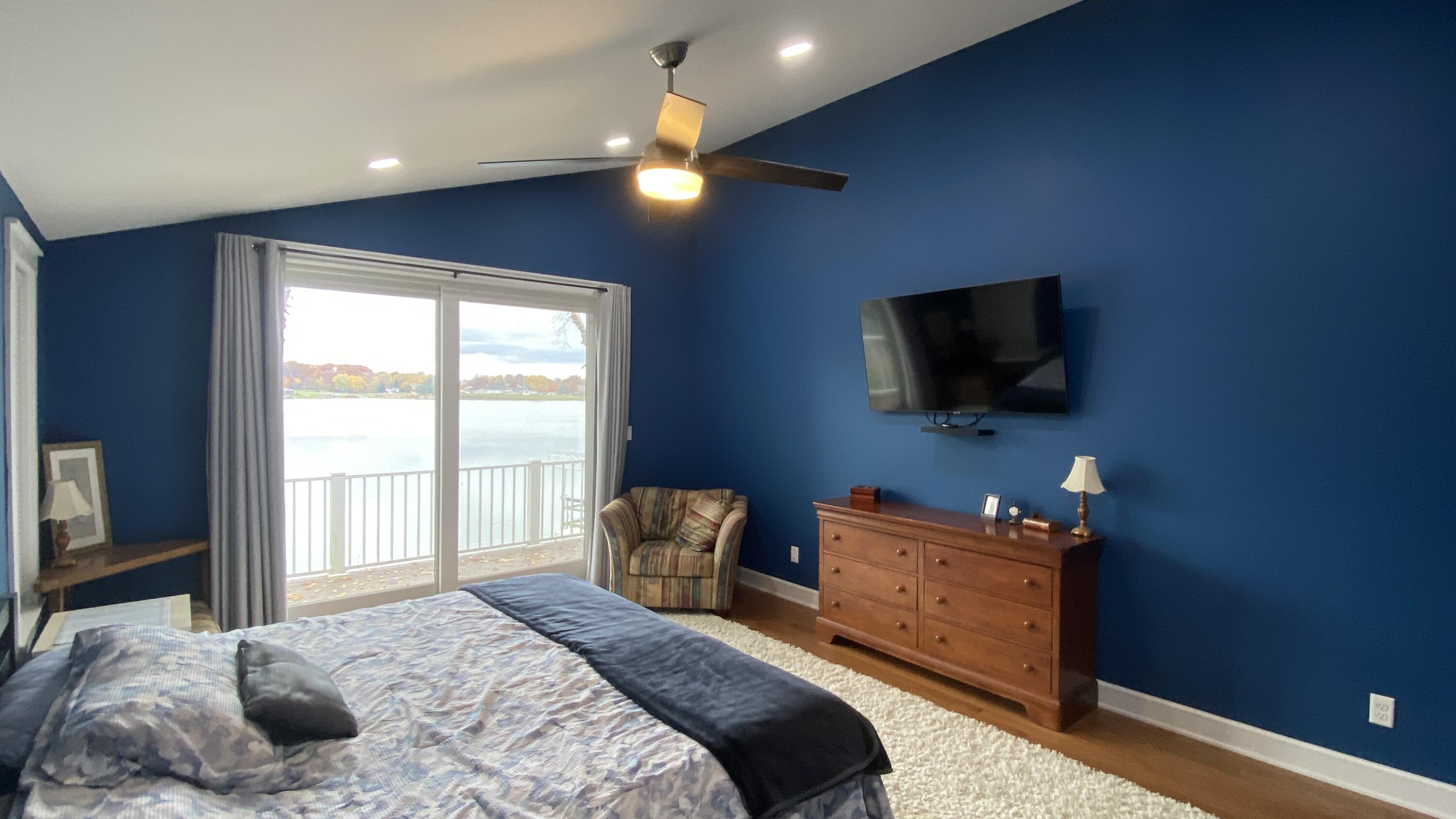 1728 Beachview Court Crown Point, IN 46307 - Photo 32 of 114 a bedroom with a bed and a television