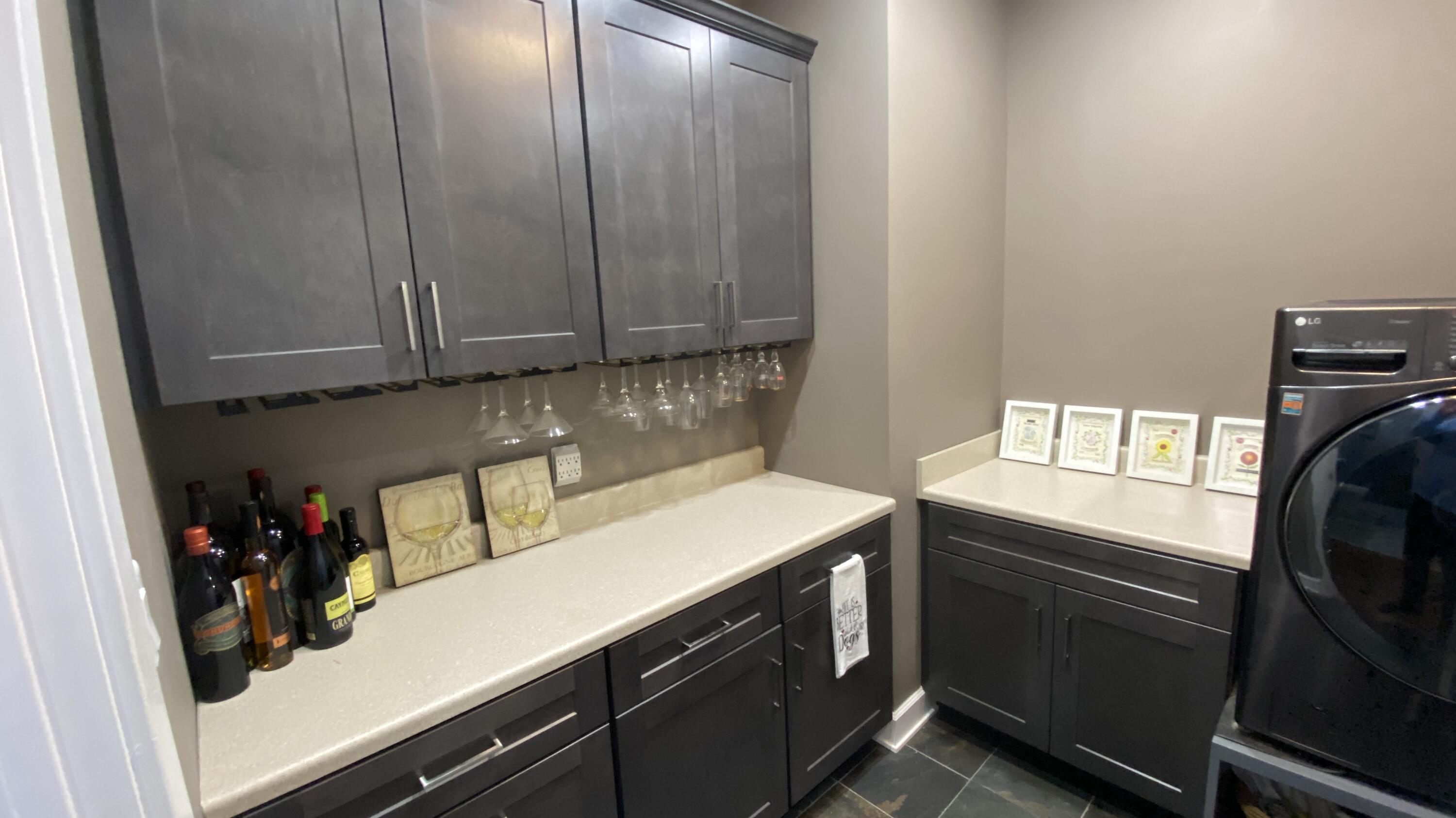 1728 Beachview Court Crown Point, IN 46307 - Photo 40 of 114 a view of a kitchen with fridge and wooden floor