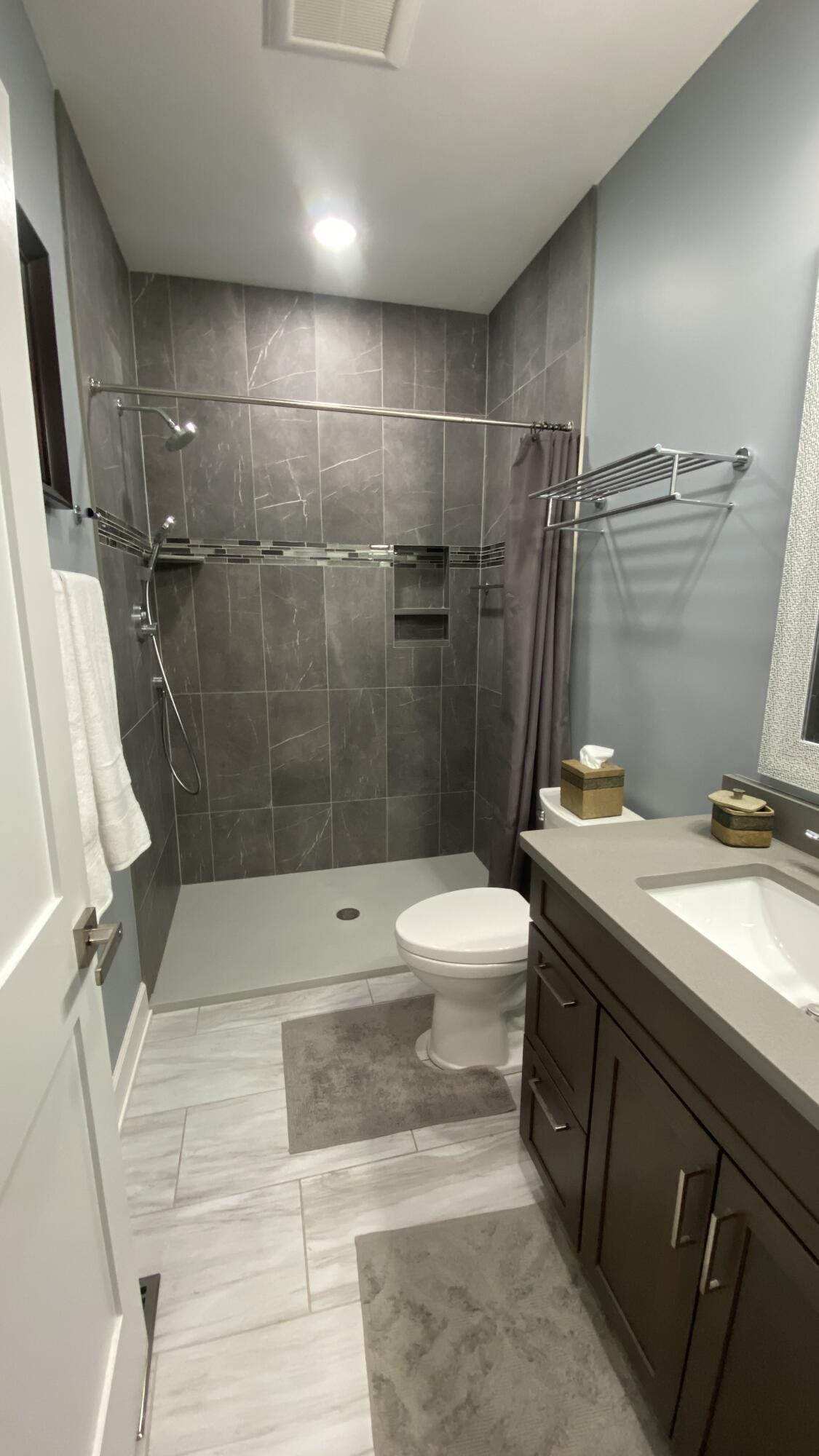1728 Beachview Court Crown Point, IN 46307 - Photo 47 of 114 a bathroom with a sink a toilet and shower