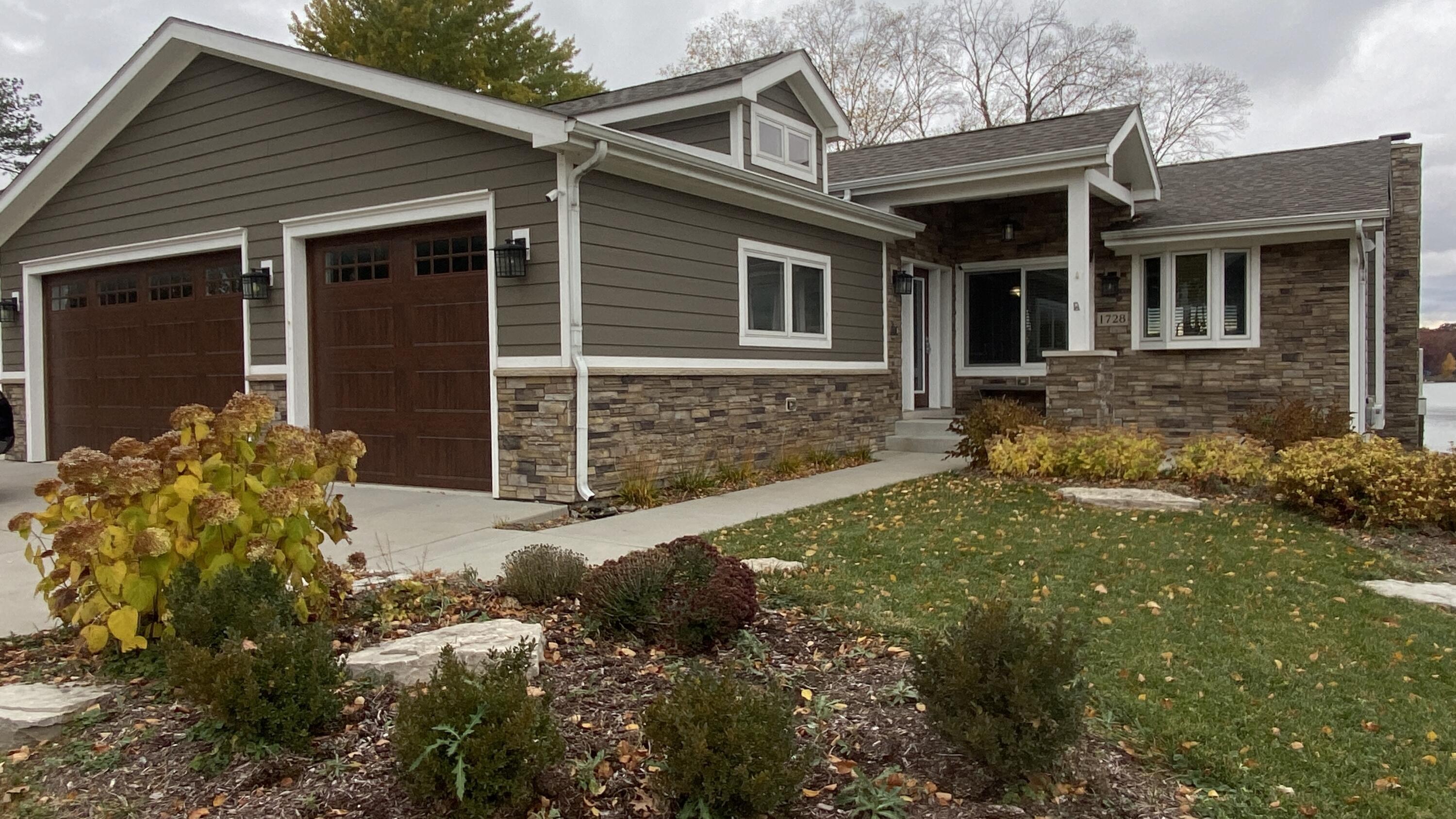 1728 Beachview Court Crown Point, IN 46307 - Photo 81 of 114 a front view of a house with a yard