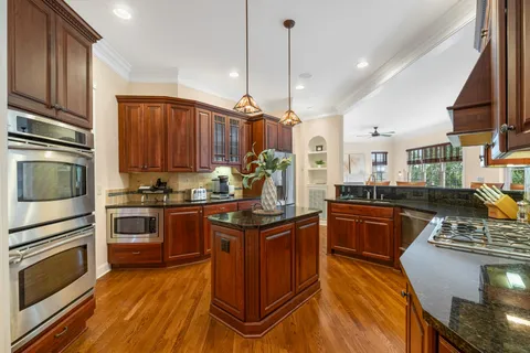a kitchen with appliances and cabinets