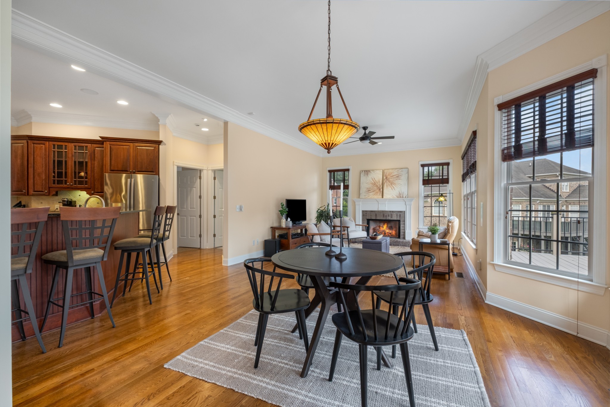 424 Sandcastle Road Franklin, TN 37069 - Photo 22 of 65 a view of a dining room with furniture window and wooden floor