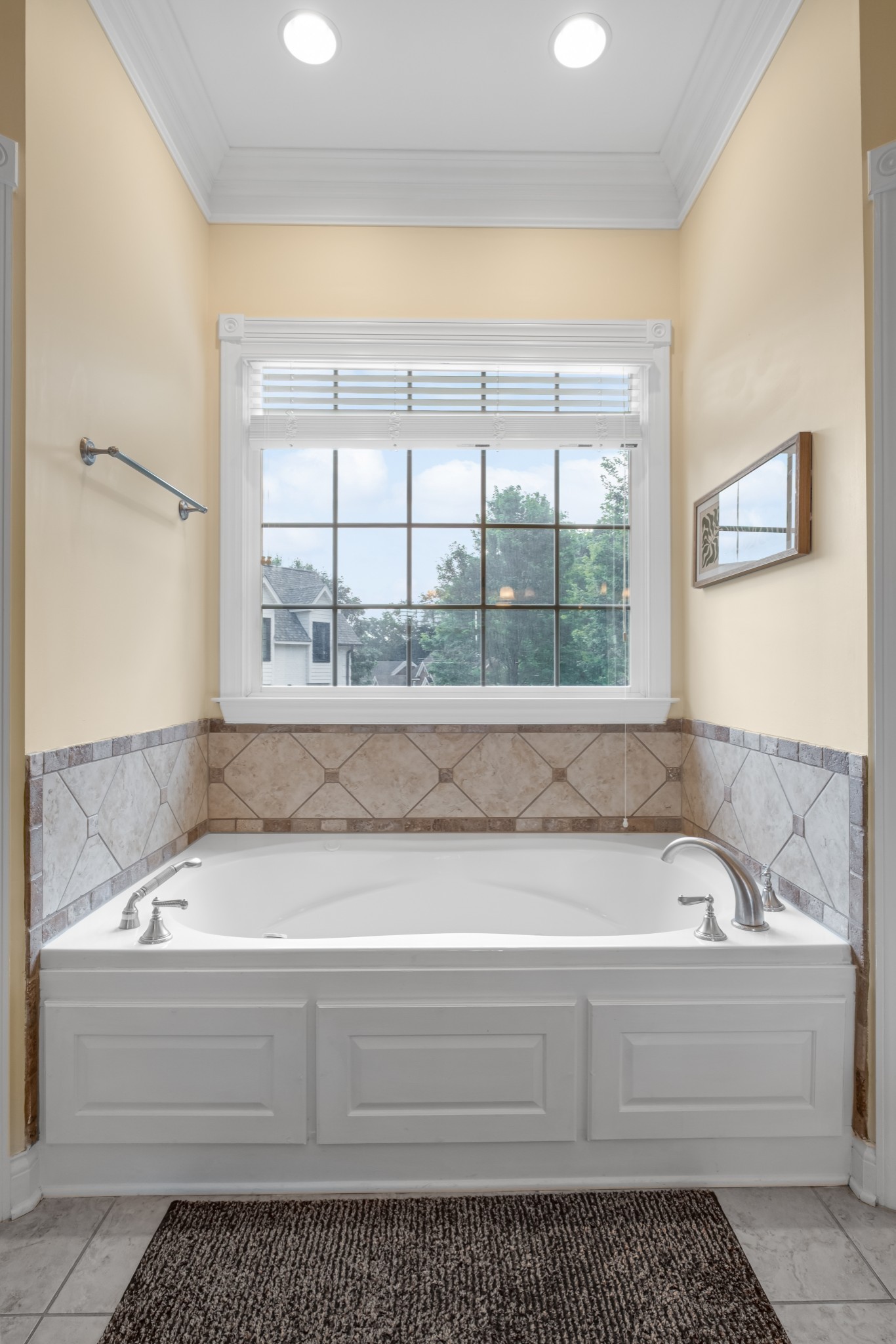 424 Sandcastle Road Franklin, TN 37069 - Photo 32 of 65 a bathroom with a bathtub and next to a window