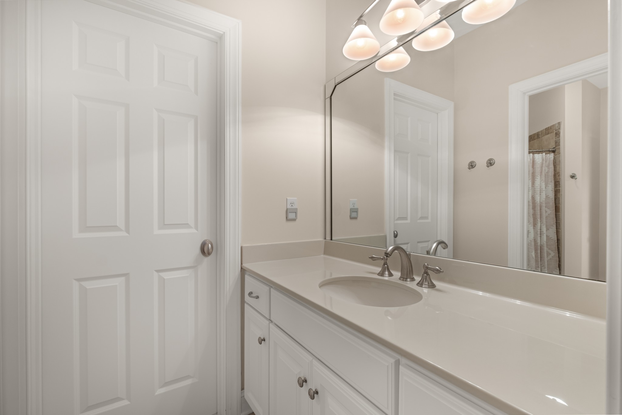 424 Sandcastle Road Franklin, TN 37069 - Photo 51 of 62 a bathroom with a sink and a mirror